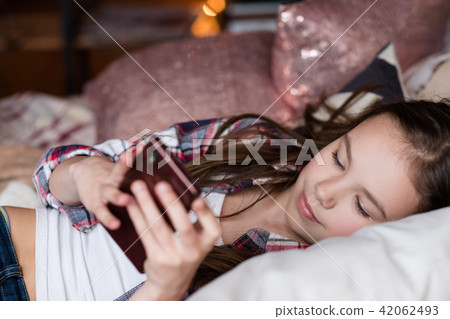 child technology addiction girl using phone 42062493