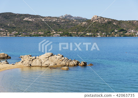 Cala Ginepro beach in Sardinia, Italy. Cala Ginepro beach in Sardinia, Italy. 42063735