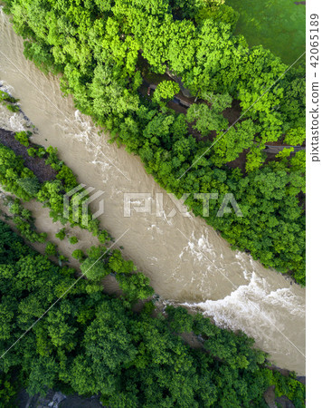 River which increases water (aerial shooting) River which increases water (aerial shooting) 42065189