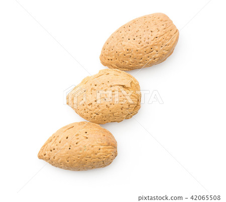 Raw almonds isolated on white Raw almonds isolated on white 42065508