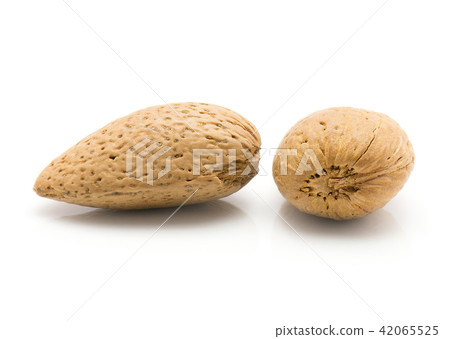 Raw almonds isolated on white Raw almonds isolated on white 42065525
