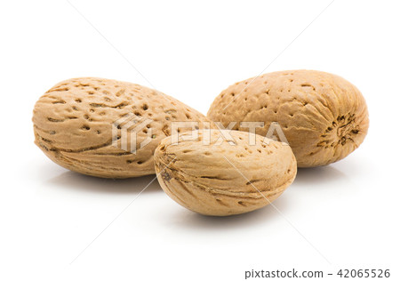 Raw almonds isolated on white Raw almonds isolated on white 42065526