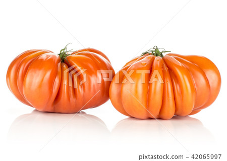 Fresh Raw Beef Tomato isolated on white Fresh Raw Beef Tomato isolated on white 42065997