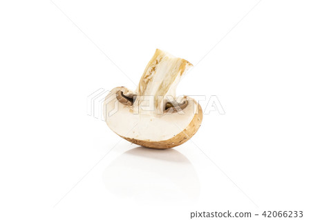 Fresh raw brown champignons isolated on white Fresh raw brown champignons isolated on white 42066233