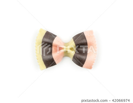 Colourful raw farfalle isolated on white Colourful raw farfalle isolated on white 42066974