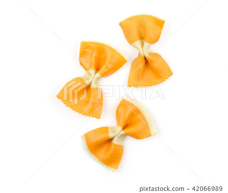 Colourful raw farfalle isolated on white Colourful raw farfalle isolated on white 42066989
