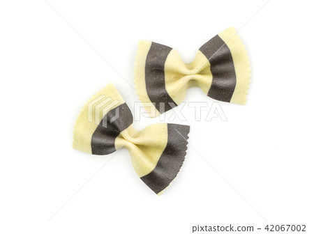 Colourful raw farfalle isolated on white Colourful raw farfalle isolated on white 42067002