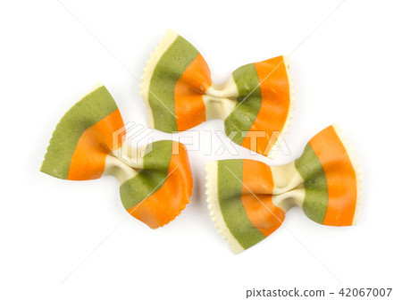 Colourful raw farfalle isolated on white Colourful raw farfalle isolated on white 42067007