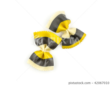 Colourful raw farfalle isolated on white Colourful raw farfalle isolated on white 42067010