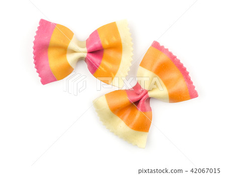 Colourful raw farfalle isolated on white Colourful raw farfalle isolated on white 42067015