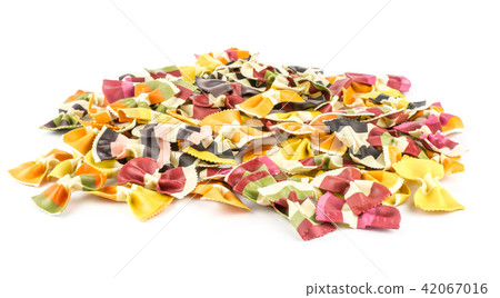 Colourful raw farfalle isolated on white Colourful raw farfalle isolated on white 42067016