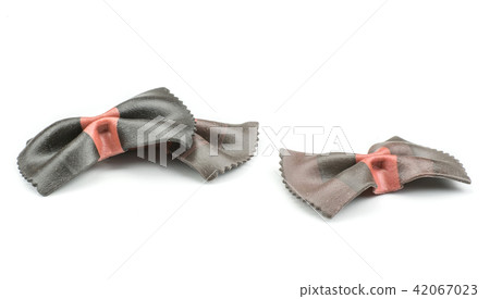 Colourful raw farfalle isolated on white Colourful raw farfalle isolated on white 42067023