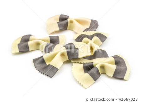 Colourful raw farfalle isolated on white Colourful raw farfalle isolated on white 42067028