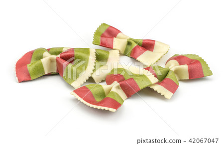 Colourful raw farfalle isolated on white Colourful raw farfalle isolated on white 42067047