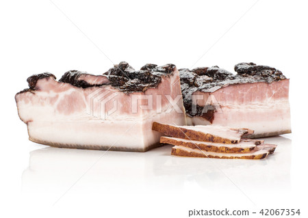 Fresh smoked english bacon isolated on white Fresh smoked english bacon isolated on white 42067354