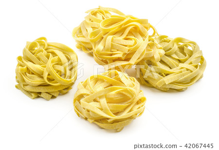 Raw fresh Fettuccine isolated on white Raw fresh Fettuccine isolated on white 42067445