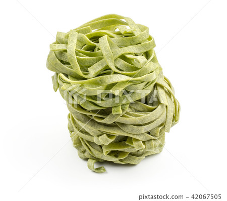 Raw fresh Fettuccine isolated on white Raw fresh Fettuccine isolated on white 42067505
