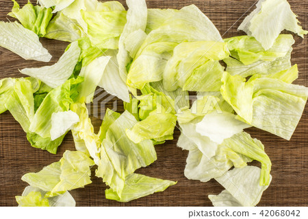 Fresh Raw Iceberg Lettuce on brown wood 42068042