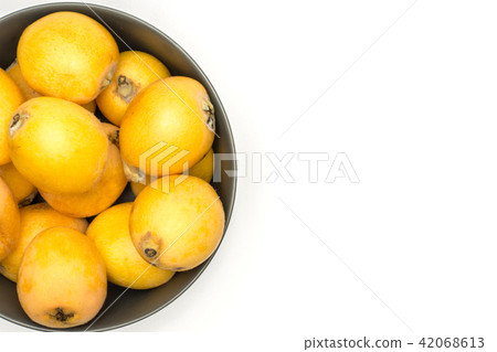 Fresh raw orange japanese loquat isolated on white Fresh raw orange japanese loquat isolated on white 42068613