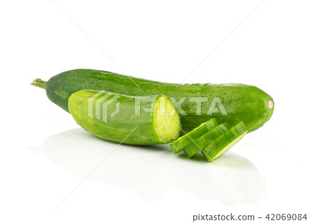 Fresh raw mini cucumber isolated on white Fresh raw mini cucumber isolated on white 42069084