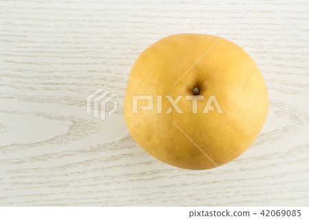 Fresh Nashi golden pear isolated on white Fresh Nashi golden pear isolated on white 42069085