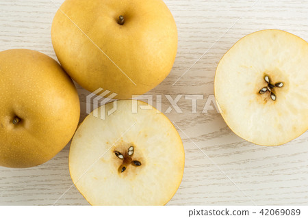 Fresh Nashi golden pear isolated on white 42069089