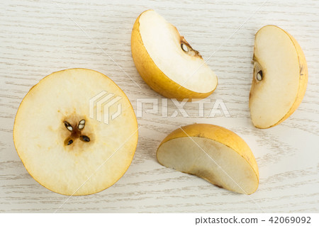 Fresh Nashi golden pear isolated on white 42069092