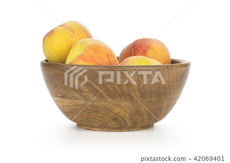 Fresh Raw yellow peach isolated on white Fresh Raw yellow peach isolated on white 42069401