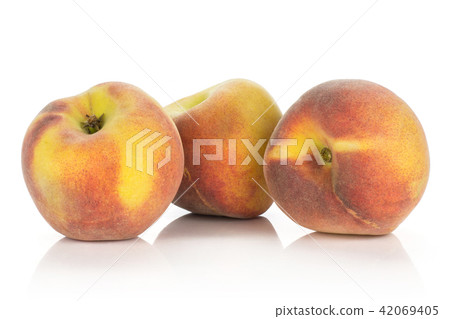 Fresh Raw yellow peach isolated on white Fresh Raw yellow peach isolated on white 42069405