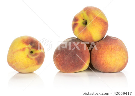 Fresh Raw yellow peach isolated on white Fresh Raw yellow peach isolated on white 42069417