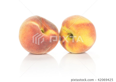 Fresh Raw yellow peach isolated on white Fresh Raw yellow peach isolated on white 42069425
