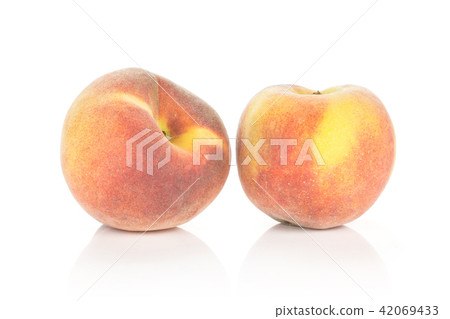 Fresh Raw yellow peach isolated on white Fresh Raw yellow peach isolated on white 42069433