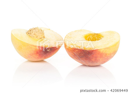 Fresh Raw yellow peach isolated on white Fresh Raw yellow peach isolated on white 42069449