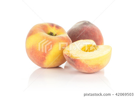 Fresh Raw yellow peach isolated on white Fresh Raw yellow peach isolated on white 42069503