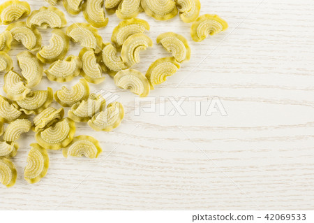 Fresh raw paste Creste di Gallo on grey wood Fresh raw paste Creste di Gallo on grey wood 42069533