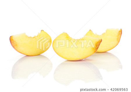 Fresh Raw yellow peach isolated on white Fresh Raw yellow peach isolated on white 42069563