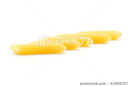 Raw fresh penne isolated on white Raw fresh penne isolated on white 42069707