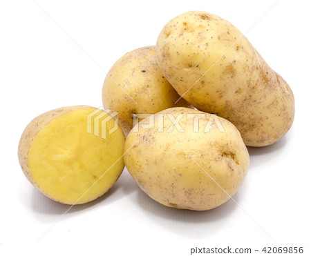 Fresh raw potatoes isolated on white Fresh raw potatoes isolated on white 42069856