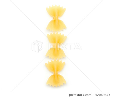 Raw fresh farfalle isolated on white Raw fresh farfalle isolated on white 42069873