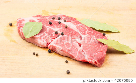 Raw pork meat isolated on white Raw pork meat isolated on white 42070090