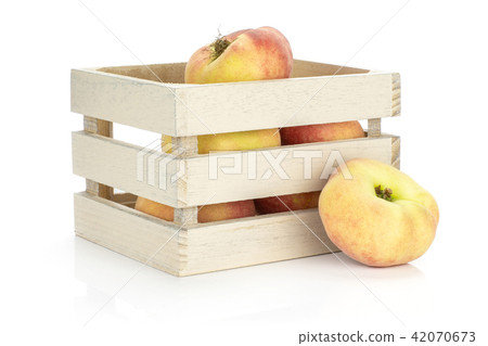 Fresh raw saturn peach isolated on white Fresh raw saturn peach isolated on white 42070673
