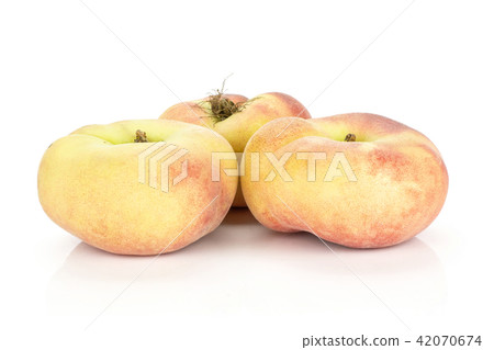 Fresh raw saturn peach isolated on white Fresh raw saturn peach isolated on white 42070674