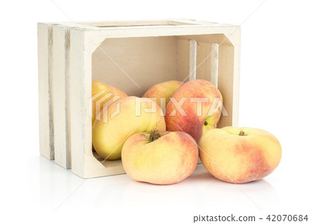 Fresh raw saturn peach isolated on white Fresh raw saturn peach isolated on white 42070684