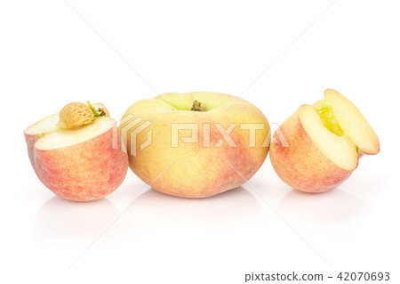 Fresh raw saturn peach isolated on white Fresh raw saturn peach isolated on white 42070693
