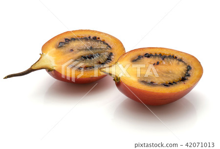 Fresh raw tamarillo isolated on white Fresh raw tamarillo isolated on white 42071013