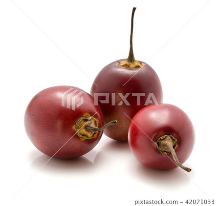 Fresh raw tamarillo isolated on white Fresh raw tamarillo isolated on white 42071033