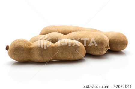 Tamarind fruit isolated on white Tamarind fruit isolated on white 42071041