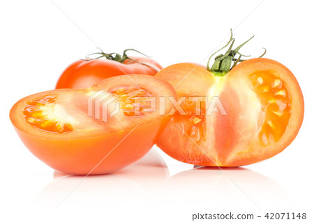 Fresh raw Tomato (La Parcela) on black wood Fresh raw Tomato (La Parcela) on black wood 42071148