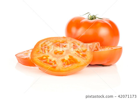 Fresh raw Tomato (La Parcela) on black wood Fresh raw Tomato (La Parcela) on black wood 42071173