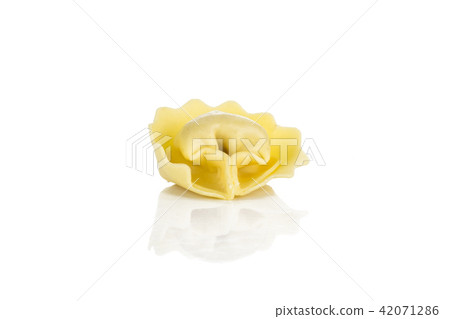 Fresh Raw tortellini pasta isolated on white Fresh Raw tortellini pasta isolated on white 42071286